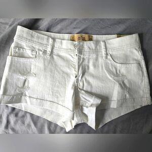 Hollister lightly distressed low rise shorts white